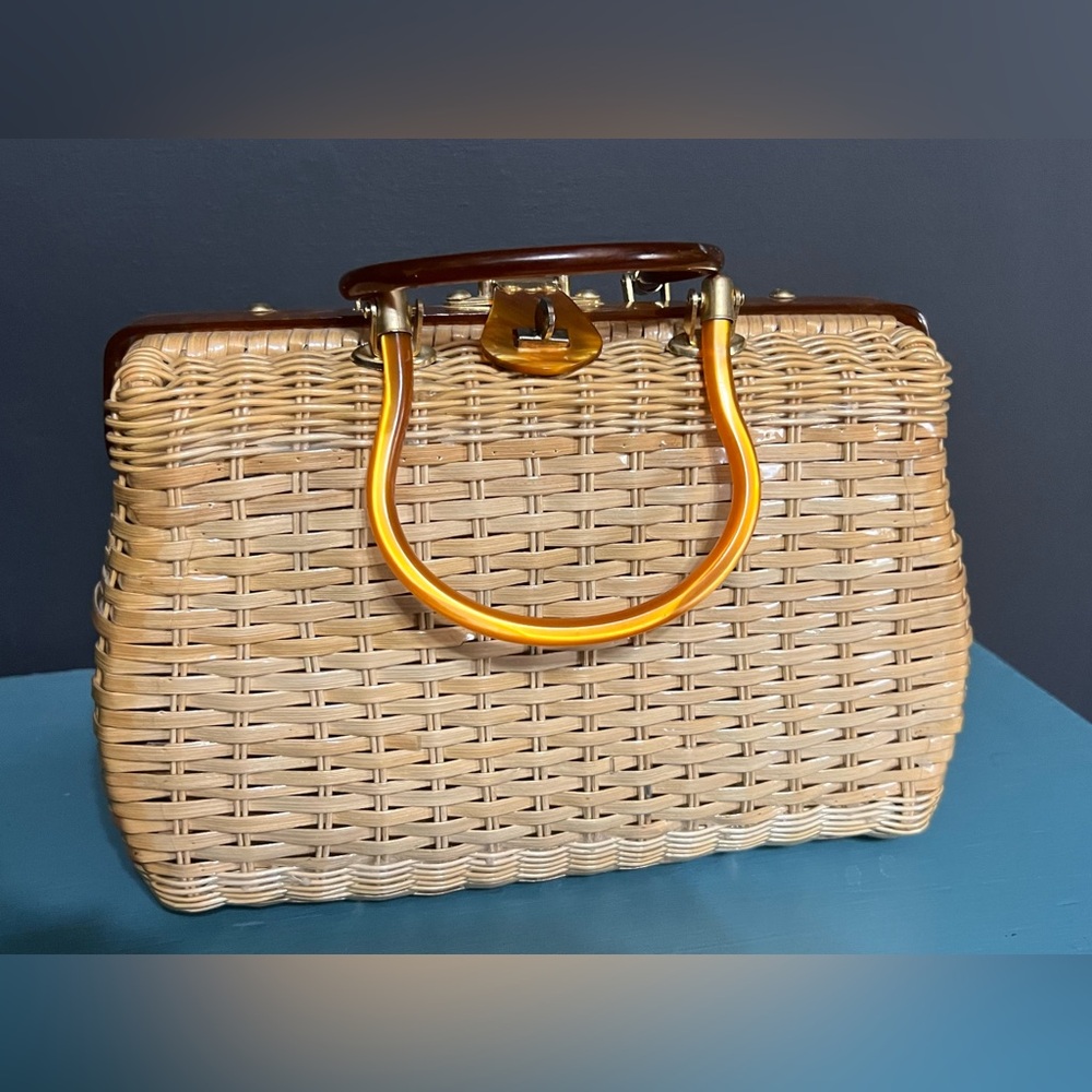 Elegant Tan Woven Handbag with Orange Accents